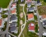 Grünachse als zentrale Verbindung im Wohngebiet